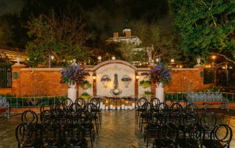 Chairs are set up for a wedding ceremony near the Haunted Mansion in Disneyland Park