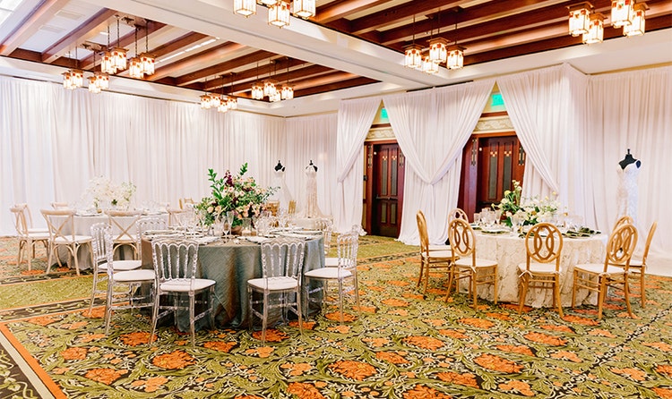 A ballroom featuring set tables and decorations on the tables at the Grand Californian Hotel and Spa