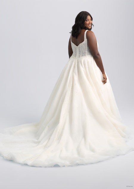 The back of a sleeveless wedding dress with a long trail inspired by Ariel from The Little Mermaid
