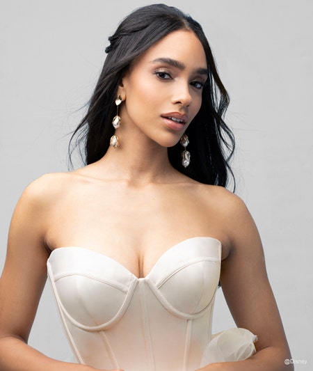 The bodice of a bride wearing a Belle inspired ball gown with a sweetheart neckline
