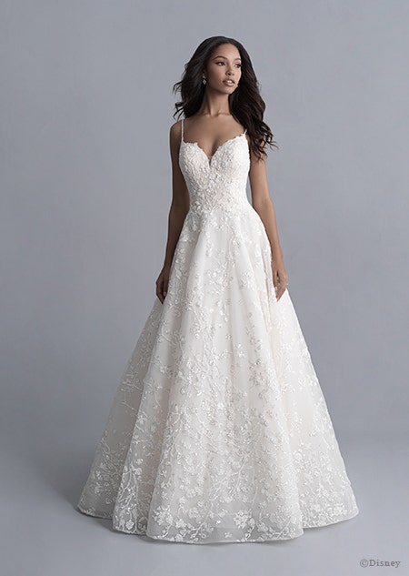 A woman wearing the Tiana wedding gown from the 2020 Disney Fairy Tale Weddings Platinum Collection