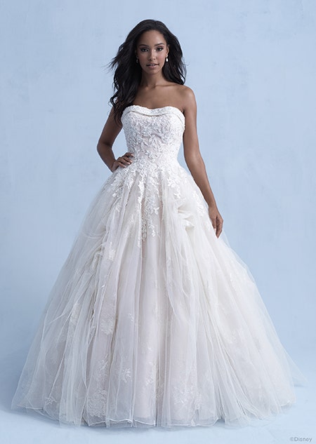 A woman wearing the Belle wedding gown from the 2021 Disney Fairy Tale Weddings Collection
