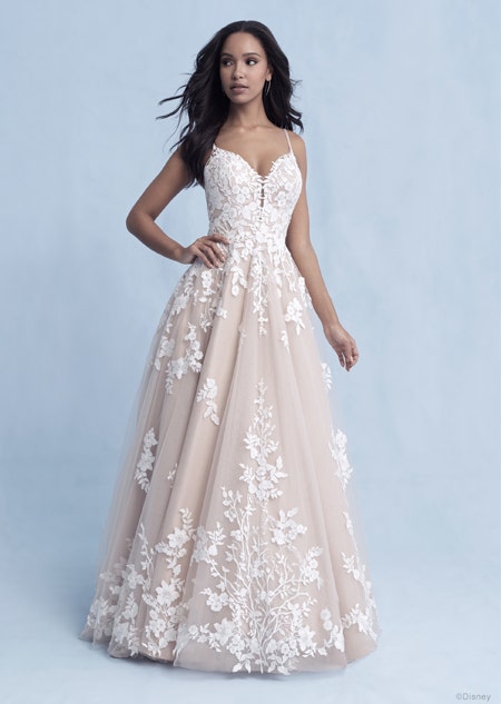 A woman in the Snow White wedding gown from the 2021 Disney Fairy Tale Weddings Collection