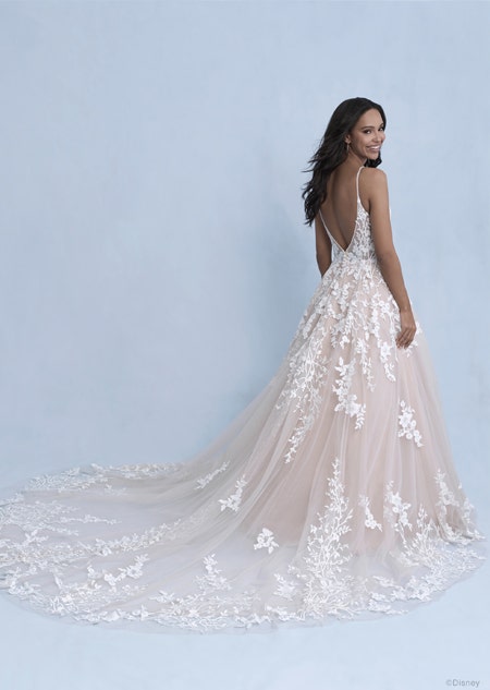 A back side view of a woman in the Snow White wedding gown from the 2021 Disney Fairy Tale Weddings