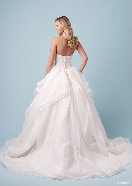 A bride showing the back of her strapless gown