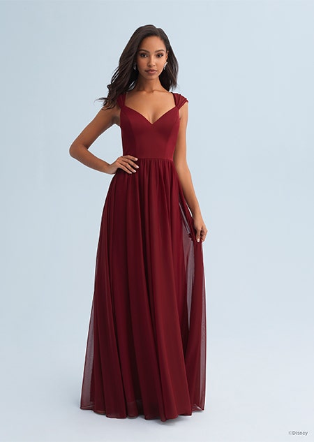 A woman wearing a Snow White themed bridesmaid dress with a V neckline