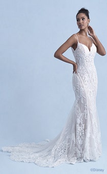 A woman in the Tiana wedding gown from the 2021 Disney Fairy Tale Weddings Collection