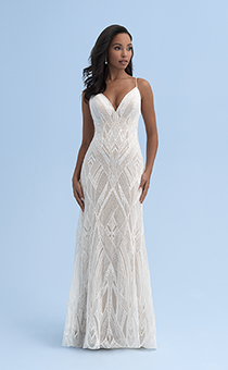 A woman wearing a wedding dress with a sweetheart neckline and skinny straps