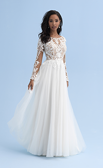 A woman wearing a wedding dress with a boat neckline and long sleeves