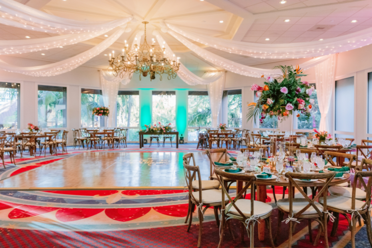 wedding reception, reception venue, tropical wedding, tropical reception, tropical flowers, tropical, tropical theme, uplighting, dance floor, reception decor