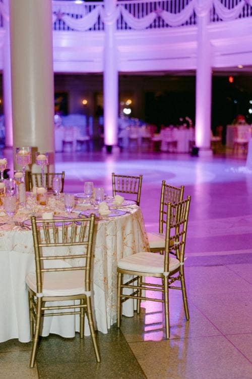 wedding reception, reception, table decor, table rounds, custom chairs, Chiavari chairs, gold chairs, Epcot, aa rotunda, American adventure rotunda
