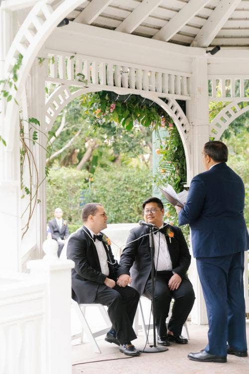 groom groom, lgbtq, lgbtq couple, wedding ceremony, ceremony, altar area, disneyland, disneyland hotel, rose court, rose court garden