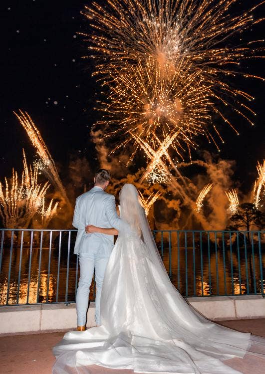 couple, candid, bride and groom, fireworks dessert party, dessert party, fireworks, reception, wedding reception, Epcot