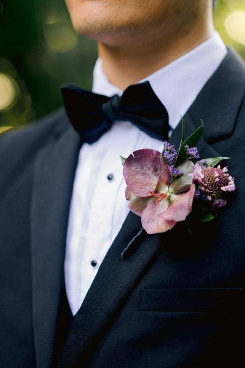 groom, floral, boutonniere, fall, halloween, halloween themed, burgundy floral, purple floral