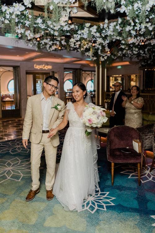 couple, entrance, reception entrance, wedding reception, reception, the bayou, bayou, Disney cruise line, cruise wedding