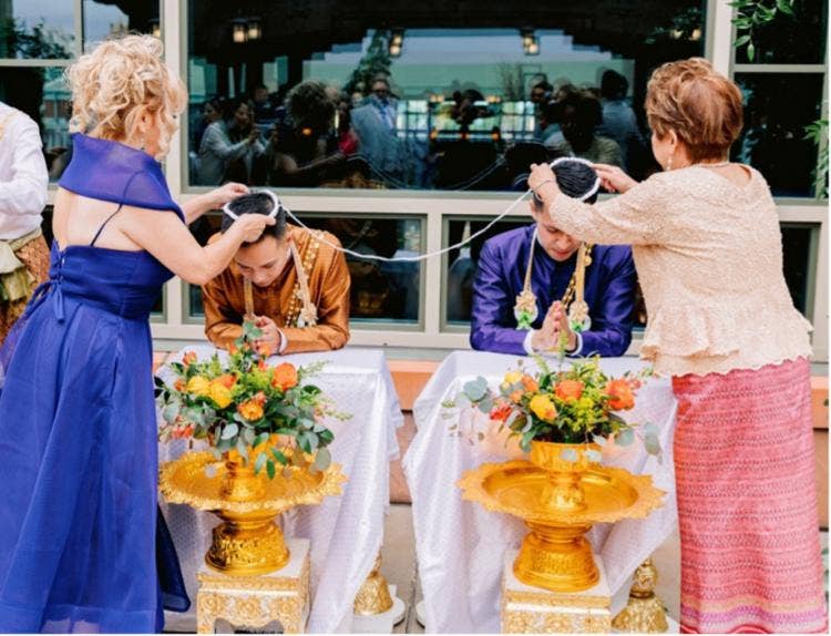 lgbtq, lgbtq couple, thai wedding, thai outfits, thai decor, wedding ceremony, ceremony, groom, groom groom, cultural ceremony, cultural wedding, tropical floral, floral, gold decor