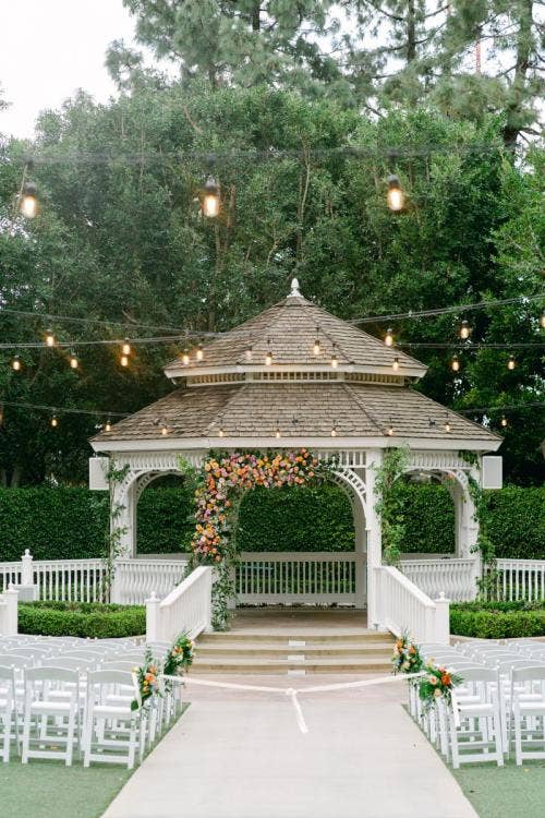 wedding ceremony, ceremony, ceremony floral, ceremony ecor, colorful floral, gazebo, altar, atlar area, disneyland, disneyland hotel, rose court, rose court garden