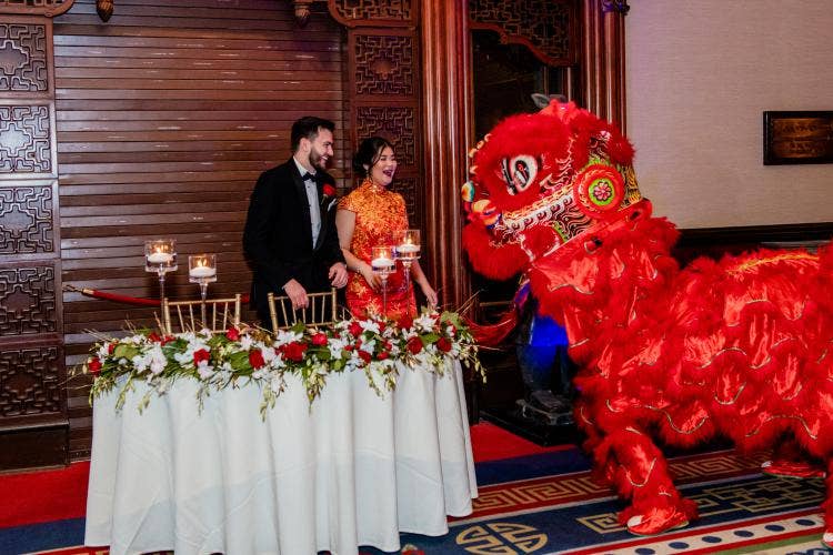couple, wedding reception, reception, china, china pavilion, great hall of china, entertainment, character, Chinese dragon, dragon character, lion dance