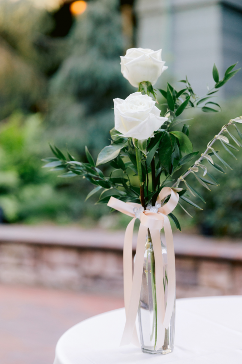 wedding ceremony, ceremony, ceremony decor, ceremony floral, white roses, roses, hidden mickey, brisa courtyard, grand californian