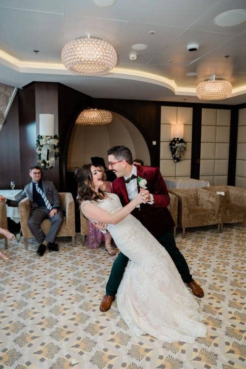 bride and groom, couple, first dance, wedding reception, reception, cake and champagne, celebration, wedding celebration, candid, dance, disney cruise line, cruise line, cruise, disney cruise, disney dream