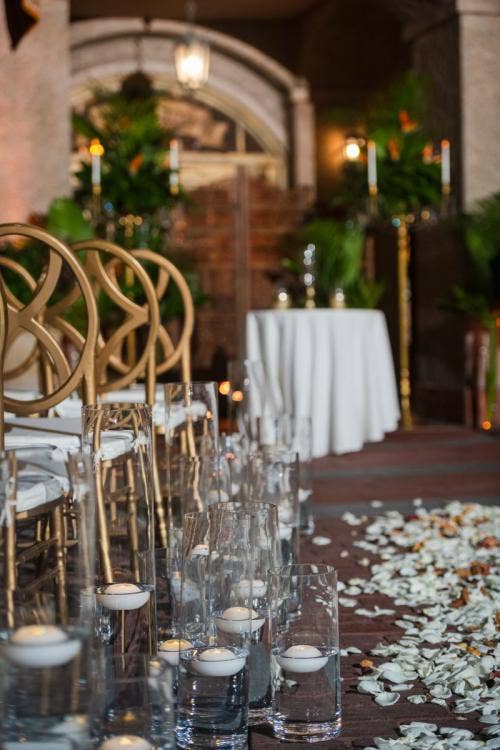 wedding ceremony, ceremony, aisle decor, aisle floral, white petal toss, petal toss, floating candles, aisle floating candles, gold chairs, custom chairs, custom gold chairs