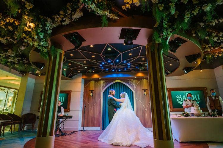 bride and groom, couple, first dance, wedding reception, reception, disney cruise line, cruise, cruise line, disney cruise, disney wish, the bayou, disney wish the bayou