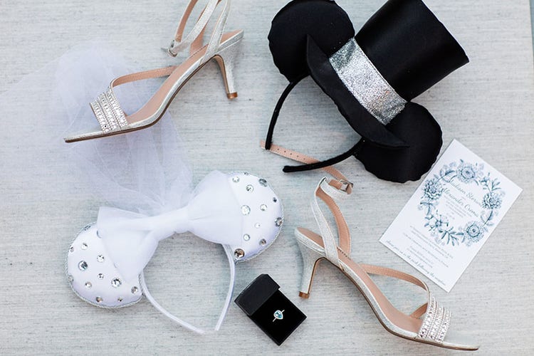 A pair of shoes and other Disney wedding accessories