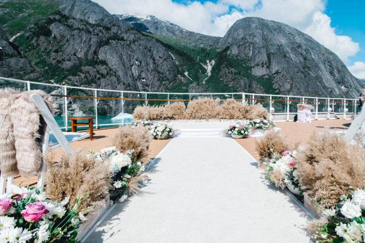 decorated wedding ceremony, wedding ceremony, ceremony, venue, decorated venue, disney cruise line, cruise line, cruise, cruise wedding, cruise line wedding, deck 10 aft overlook, deck 10 aft overlook ceremony