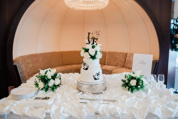 wedding cake, cake, 2 tier cake, white cake, two tier cake, nautical theme, cake and champage, reception, wedding reception, disney cruise line, cruise line, disney cruise, cruise, cruise wedding, disney dream