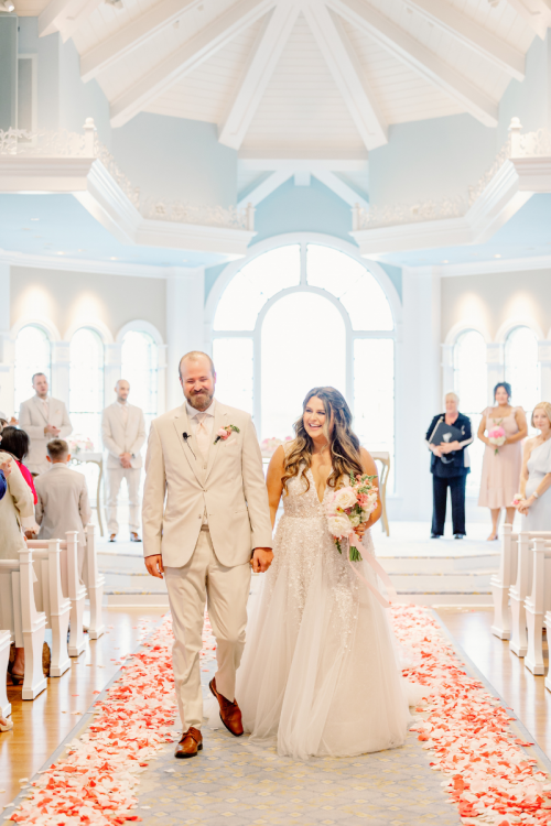 couple, bride and groom, exit, ceremony exit, wedding ceremony, disney's wedding pavilion