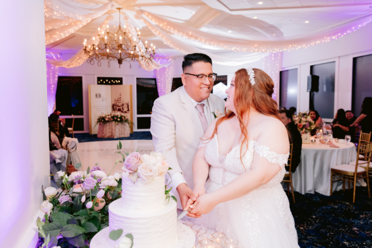 couple, cutting cake, cake, wedding reception, Disneyland Hotel, sleeping beauty pavilion