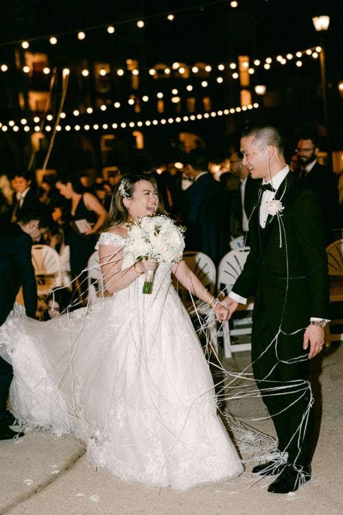 bride and groom, couple, staged exit, exit, streamers, streamer exit, Coronado, Coronado springs, casitas, casitas courtyard