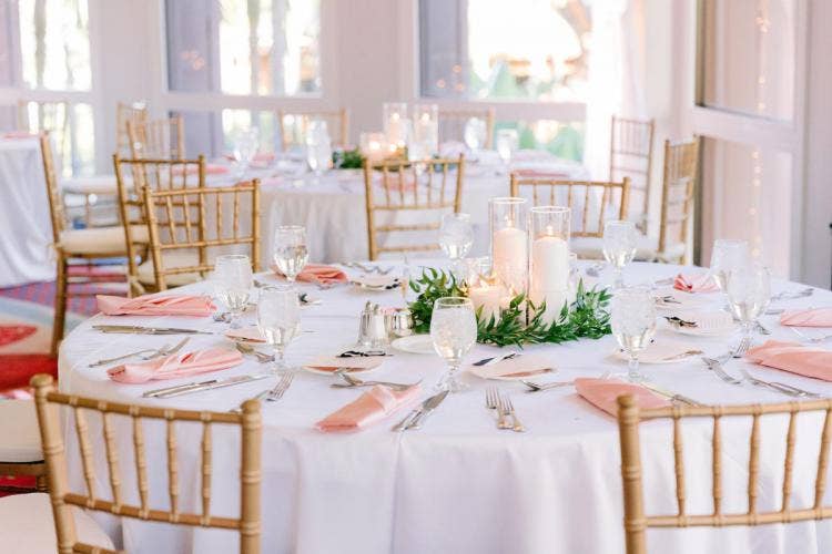 wedding reception, reception, reception decor, table decor, floating candles, candle centerpieces, gold chairs, Chiavari chairs, pink and gold