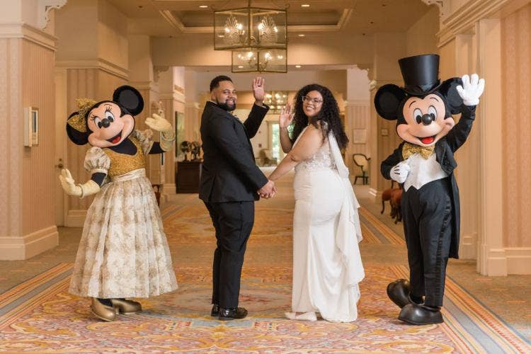 bride and groom, portrait, couple portrait, couple, entertainment, characters, mickey and minnie, mickey mouse, minnie mouse, grand floridian, grand floridian ballrooms, diversity