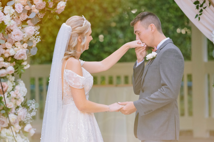 bride and groom, couple, wedding ceremony, ceremony, candid, vows, rose court, rose court garden, disneyland, disneyland hotel