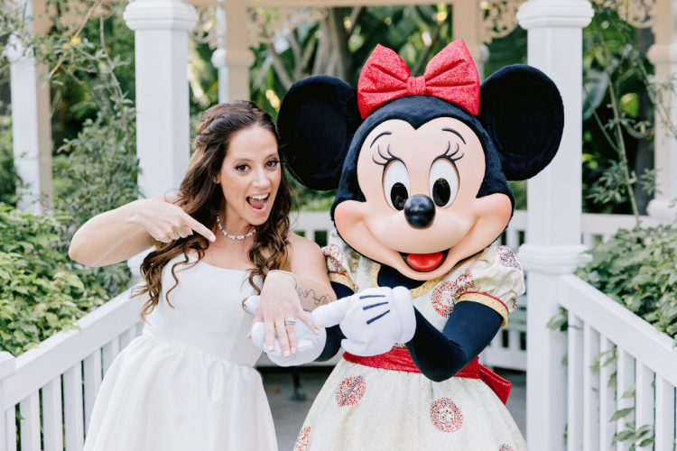 bride, bridal portrait, portrait, entertainment, characters, minnie mouse, character photos, reception, vow renewal, vow renewal reception, adventure lawn, adventure lawn gazebo, disneyland, disneyland hotel