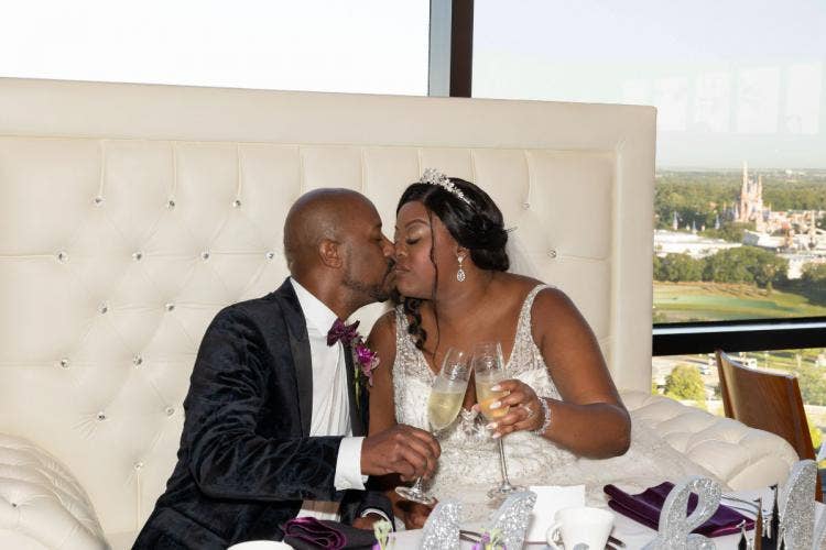 wedding reception, reception, glasses, toasting glasses, champagne glasses, sweetheart table, reception decor, bride and groom, couple, kiss, couple kiss, toast, couple toasting, couple toast