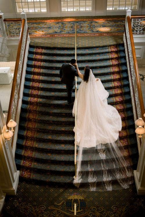 bride and groom, couple, portrait, couple portrait, grand floridian, grand floridian resort, stairs, grand floridian stairs