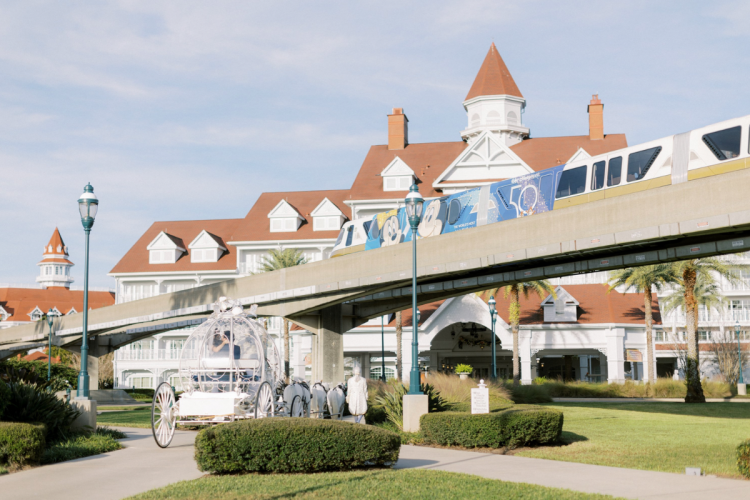bride and groom, grand floridian resort, just married, cinderella coach, monorail, wedding reception
