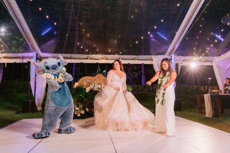 LGBTQ, couple, bride bride, wedding reception, reception, dance, reception dance, entertainment, character, stitch, Aulani, lanikuhonua, lanikuhonua reception