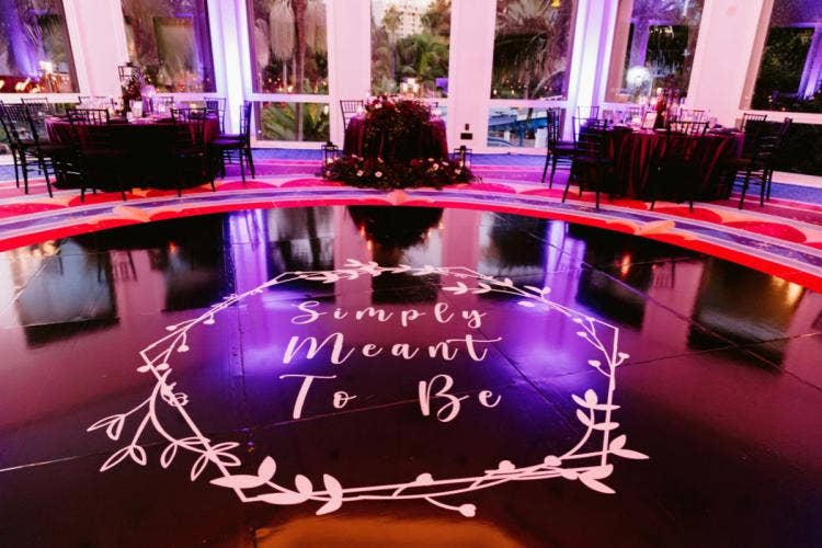 wedding reception, reception, reception decor, dance floor, recpetion dance floor, black dance floor, halloween, halloween theme, nightmare before christmas, nightmare before christmas theme, sleeping beauty pavilion, custom dance floor