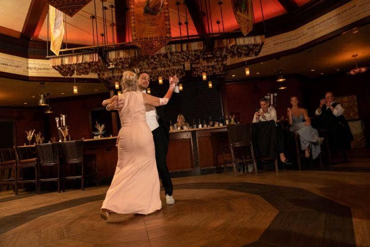 groom groom, lgbtq, lgbtq couple, first dance, dance, wedding reception, reception, disney's animal kingdom, animal kingdom, nomad lounge