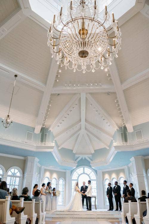 wedding ceremony, ceremony, wedding party, candid, Disney's wedding pavilion, wedding pavilion, exchanging vows, vows