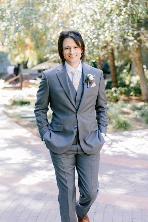 groom, portrait, groom portrait, grand californian, brisa courtyard, boutonniere, disneyland, disneyland resort