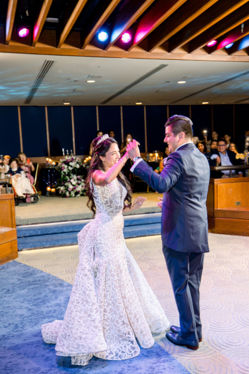 bride and groom, couple, first dance, wedding reception, reception, epcot, living seas, living seas salon, living seas reception, dance