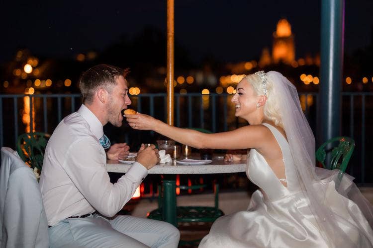 couple, candid, bride and groom, fireworks dessert party, dessert party, food, reception, wedding reception, Epcot