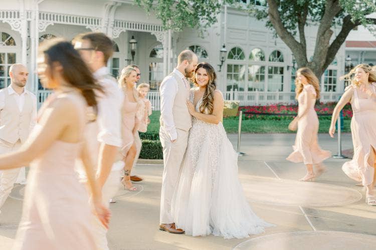 bride and groom, couple, dancing, reception, wedding reception, summerhouse patio, grand floridian