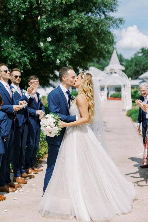 bride and groom, couple, exit, wedding ceremony, ceremony, Disney's wedding pavilion, wedding pavilion, kiss