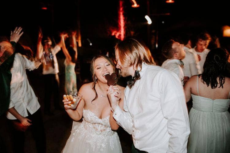 bride and groom, couple, wedding reception, reception, food & beverage, food, reception food, mickey bar, mickey ice cream bar, ice cream, Disney food, Disney's animal kingdom, animal kingdom