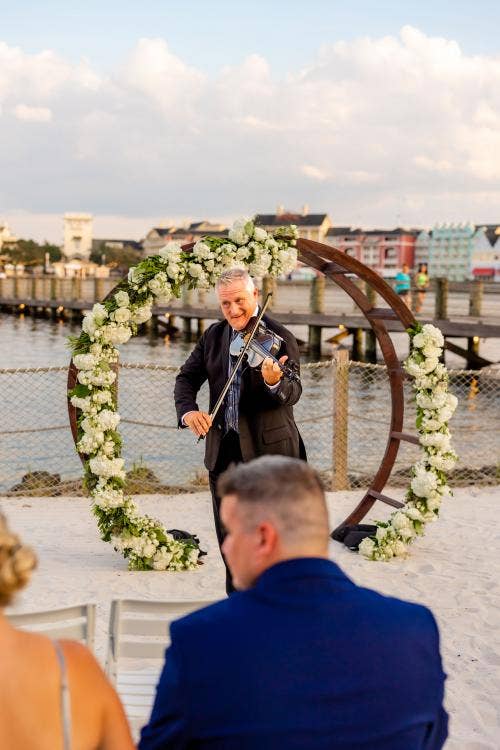 decorated wedding ceremony, ceremony, wedding ceremony, entertainment, musician, violinist, yacht club, yacht and beach club, crescent cove, waterfront, beach